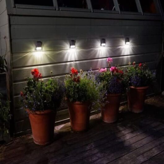 Set of 4 x 3L solar lights for fences, walls, and posts - Super bright lighting for outdoor use, gardens, patios, garages, and sheds